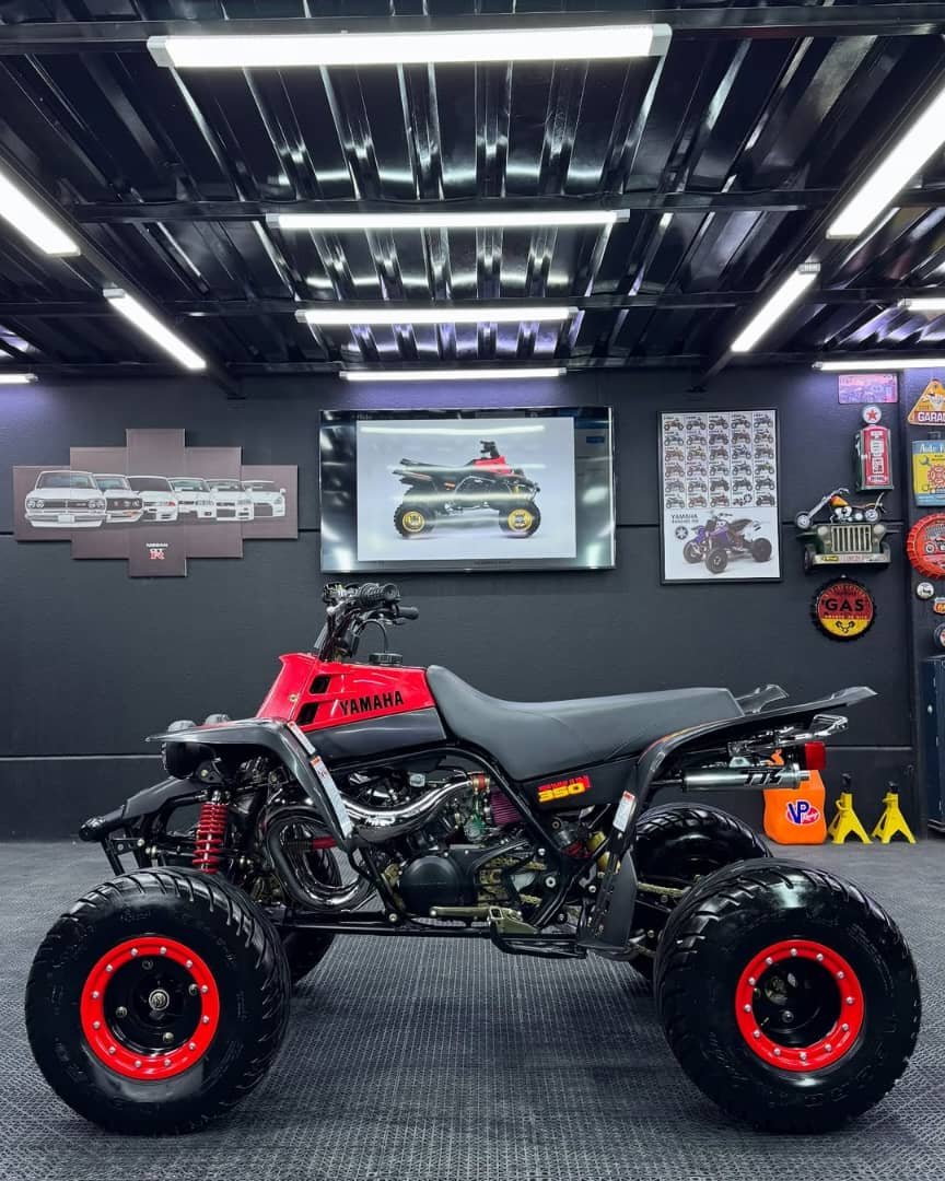 A classic high-performance ATV powered by a 347cc twin-cylinder 2-stroke engine, delivering aggressive acceleration and top-end speed. Equipped with a 6-speed manual transmission, dual carburetors, lightweight frame, and independent suspension with hydraulic disc brakes for excellent control. Built for dunes and racing, the 1997 Banshee 350 is known for its raw power, iconic sound, and timeless performance.
