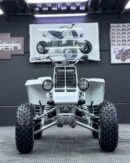A legendary sport ATV powered by a 347cc twin-cylinder 2-stroke engine, delivering explosive acceleration and high-speed performance. Features a 6-speed manual transmission, dual carburetors, lightweight frame, and independent suspension with hydraulic disc brakes for maximum control. Built for dunes and racing, the Banshee 350 is known for its raw power, iconic sound, and unbeatable performance.